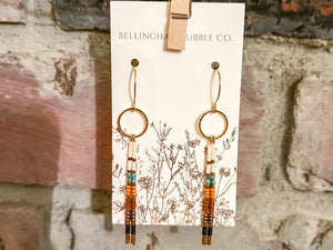 Sun Ray Tassel Earrings